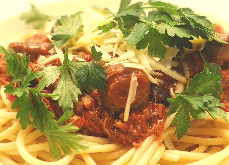 Spaghetti with Braised Pork Shoulder, Mushroom Sauce, and Fontina Cheese
